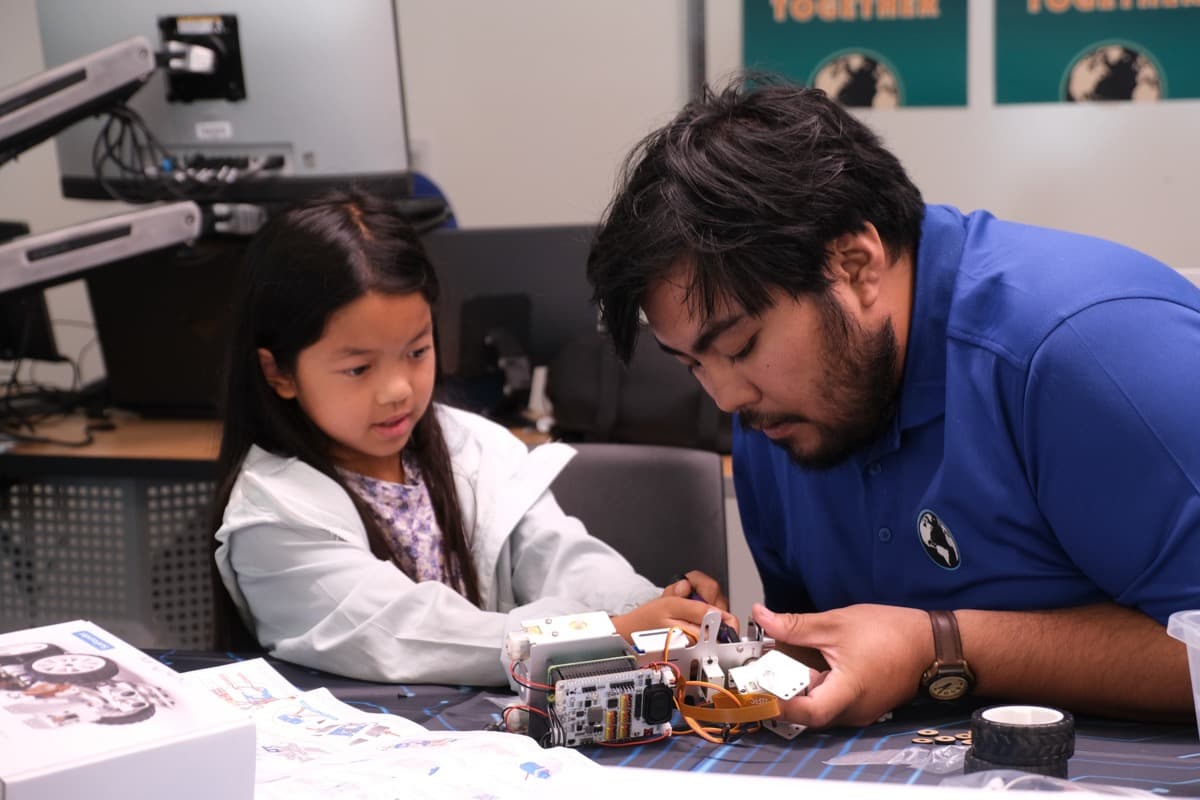 Instructor working with a student