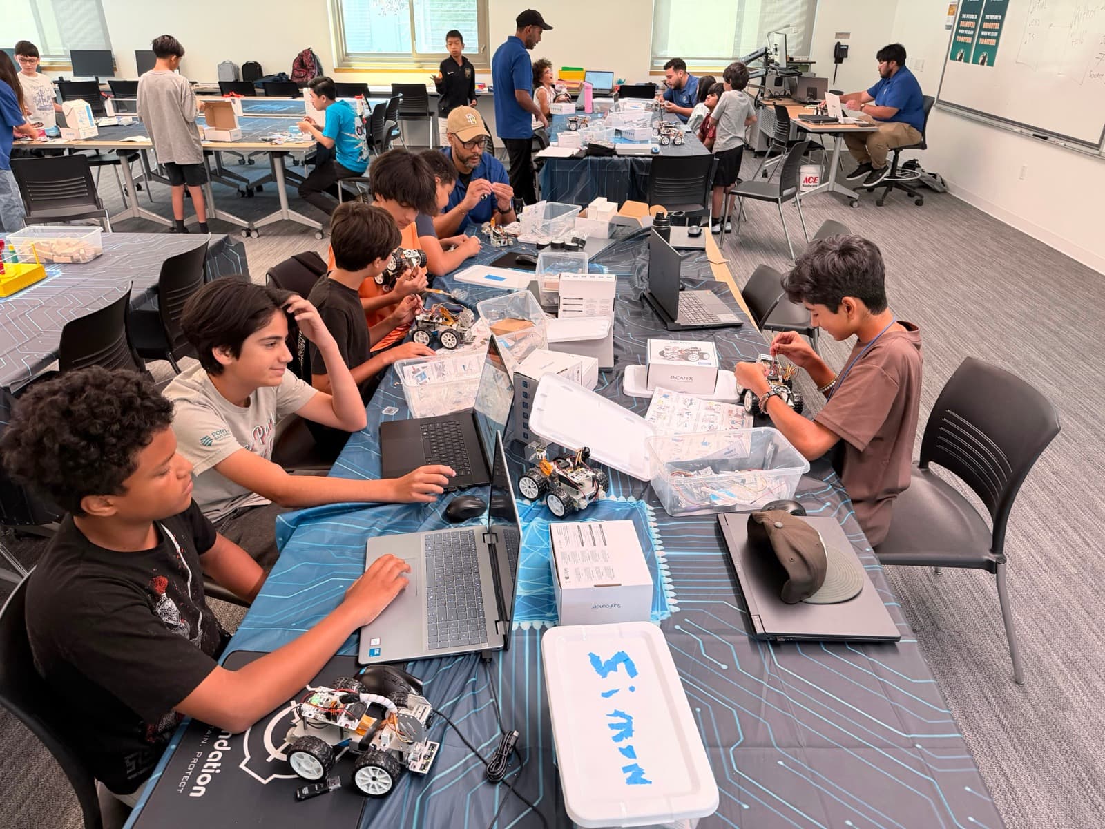 Students building STEM projects in a school classroom